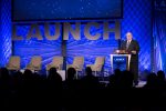 Kevin O'Connell at podium with "LAUNCH" event backdrop