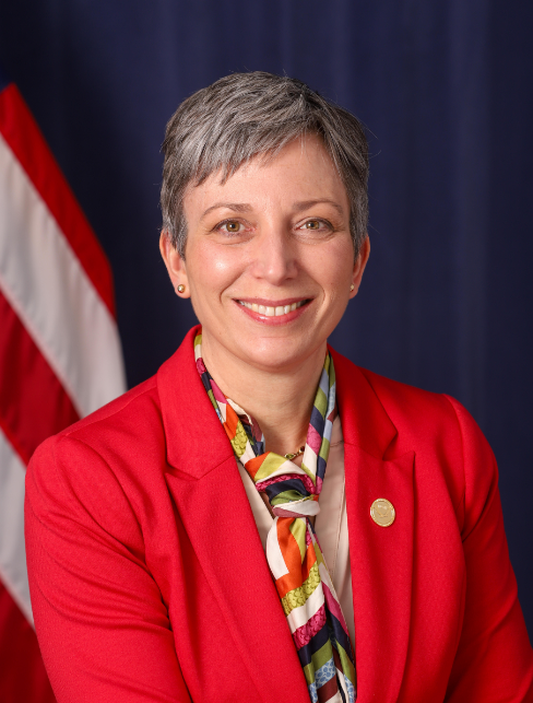 Janice Starzyk with U.S. flag